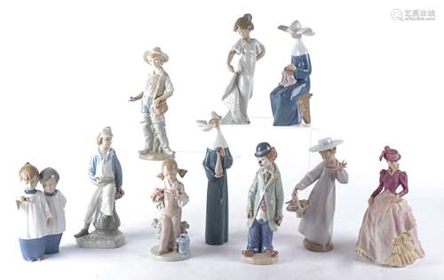 A small collection of Lladro Spanish porcelain figures and British Royal Doulton figures, the Lladro