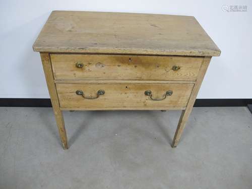 A 19th century wax pine press stand, with two long drawers, raised on square tapering supports, 84cm