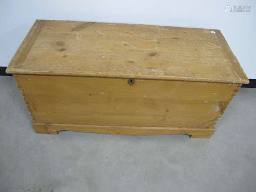 A 19th century wax pine blanket box, dovetailed body, candle box to the interior, brass carrying