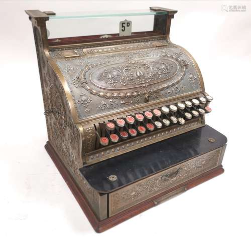 A cast brass 'National' cash register, factory number 738576, size 346, sold by the National Cash