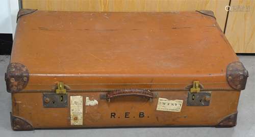 An early 20th Century pine panelled shipping trunk, with two leather straps and partial Cunard