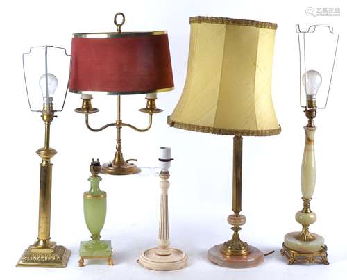 A group of nine assorted table lamps to include a brass two branch candelabra style table lamp,