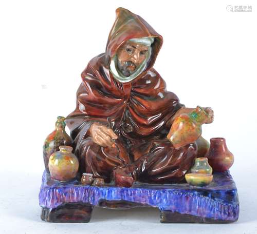 A Royal Doulton Figure of 'The Potter' HN1519, seated cross-legged surrounded by pots, height