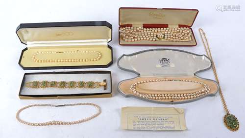 Four items of costume jewellery one a cased bracelet and necklace marked 'genuine jade', length of