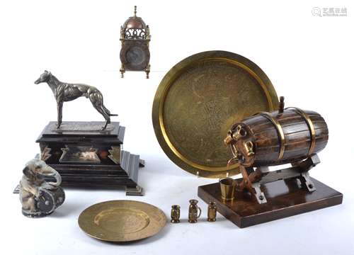 An ebonised oak box mounted with silver plate panels supporting a spelter figure of a greyhound,