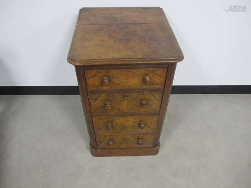 A 19th century burr walnut chest of narrow proportions, with two short drawers and one deep, moulded