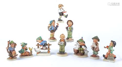 Ten Goebel Hummel figures of young boys, comprising 'Merry Wanderer' no.11, 'Apple Tree Boy' no.142,