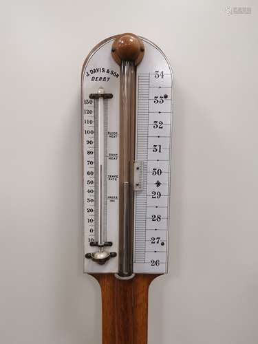 A late 19th or early 20th Century narrow stick shaped oak barometer by J. Davis & Son of Derby,