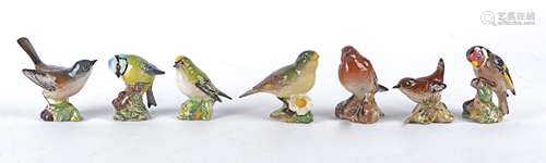 Seven Beswick pottery birds, Goldcrest, Robin, Greenfinch, Goldfinch, Whitethroat, Wren and Blue