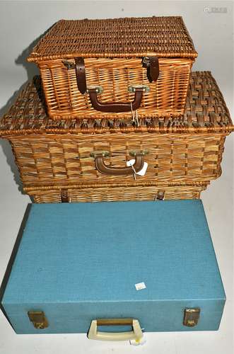 Four 20th Century picnic baskets, by Sirram, Brexton and Optima, one with cups with a wintery pine