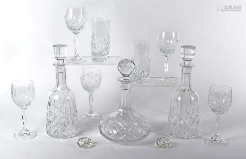 A 20th Century squat cut glass decanter with multifaceted spherical stopper, height 27cm, together