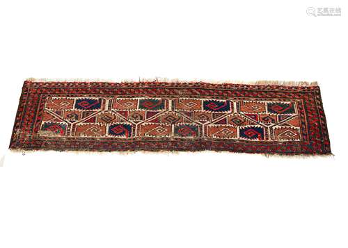 A Turkman woollen small mat, the central panel with hooked and serrated edged guls against a cream