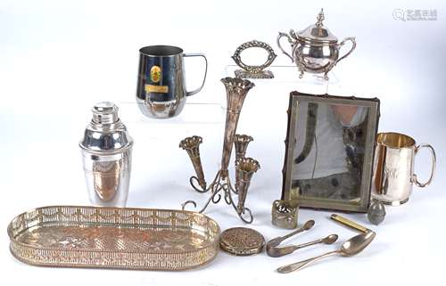 An extensive quantity of silver plate to include a four footed and three fluted silver plated