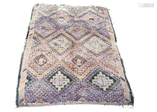 A contemporary Najat Benim gilt rug, of Moroccan origin of rectangular form with central pattern