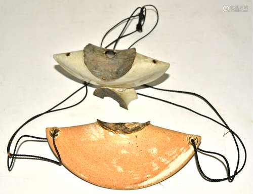 A 1960's contemporary pottery stoneware vessel with raku circular top and ash glazed base, supported