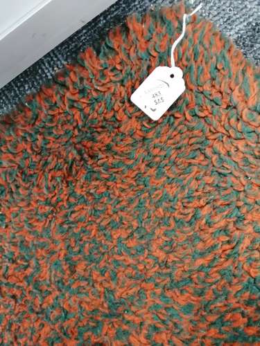 A mid Century woollen rectangular rug, with all over orange and emerald green pile throughout, 278cm