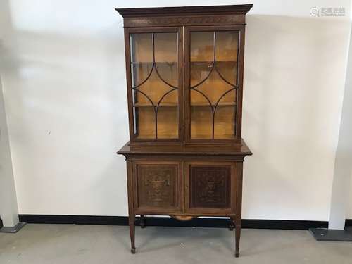 An Edwardian mahogany Regency revival display cabinet, glazed upper section with lower section