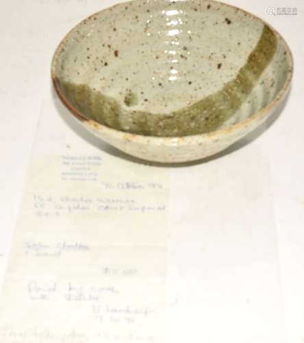 John Chalke (1940-2014), a stoneware hand thrown footed bowl with an interior ribbed form with ash