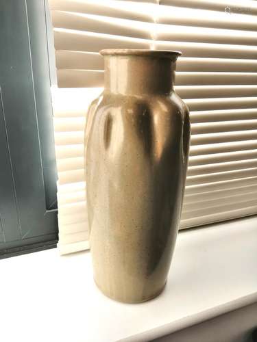 A Royal Doulton stoneware cylindrical vase of pinched waisted design with celadon glaze, the base