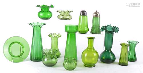 Various pieces of 19th Century and later green glass ware predominantly vases in varying shapes