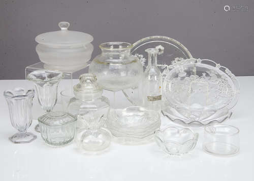 A collection of miscellaneous moulded and cut glassware, including an octagonal storage jar and lid,