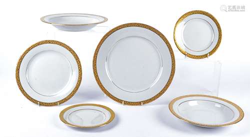 A Royal Gallery 20th Century porcelain part dinner service, in the gold buffet pattern, comprising