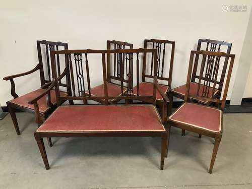 An Edwardian mahogany inlayed saloon suit, with inlaid banding and walnut panel, comprising two seat