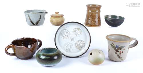 Ten pieces of 20th Century British studio pottery to include a half spherical bowl with a