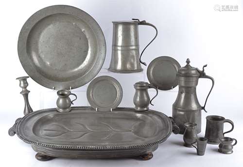 An Arts and Crafts style pewter twin-handled tray, stamped 'I Vickers' to base, with impressed