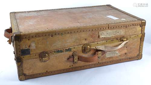 An Early 20th Century Antler travel trunk, vellum with brass fittings, stamped 'F.L.M.N.S.',