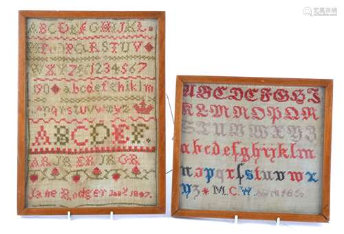 Two 19th Century cross stitch alphabet samplers, one by 'M.C.W. April 1852', 18.5cm x 20.5cm, the