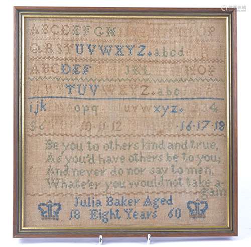 A 19th Century cross stitch sampler, by 'Julia Baker aged Eight Years', dated 1860, featuring the