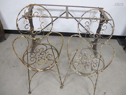 A vintage cast iron table base, with shaped end supports with a thistle design 110cm x 40cm x68cm,