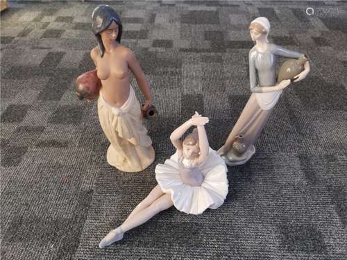 A Lladro Gres figure 'Water Girl', no. 2323, height 35cm, altogether with a Lladro figure of a woman