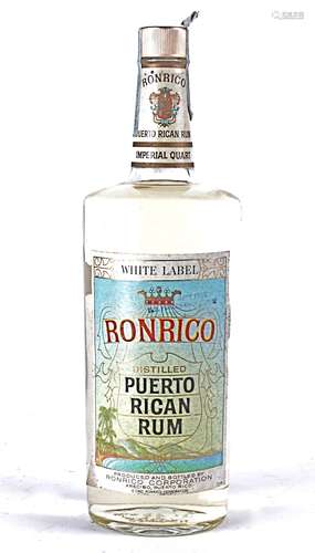 A bottle of 1960's Ronrico Puerto Recan White rum, sealed with the original tags, Imperial Quarte