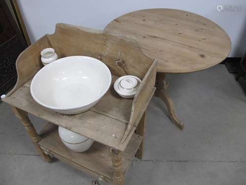 A Victorian stripped pine wash stand, gallery back, single drawer, raised on turned front