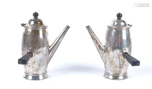Two George V hallmarked silver side handled chocolate pots, Birmingham maker Barker