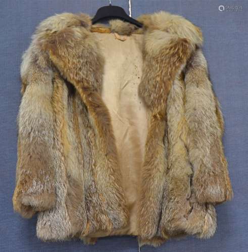 A ladies vintage fur jacket possibly racoon, grey and brown with revered collar, brown silk