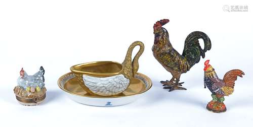 A 20th Century Dresden porcelain sauceboat and stand, modelled as a gilt swan with white glazed