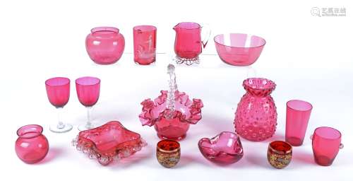 A quantity of 19th Century and later cranberry glass, to include a glass vase with raised effect,