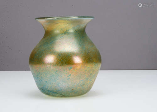 A continental iridescent ovoid vase, with sloping shoulders, waisted neck and splayed rim with an