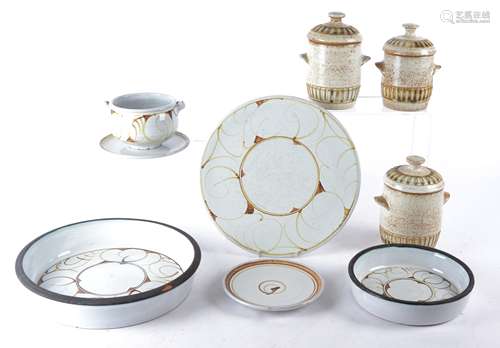 Seven Aldermaston tin glazed pottery dinner plates after designs by Alan Caiger Smith(1930-2020) ,