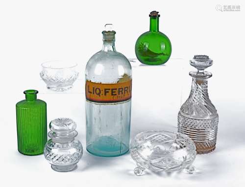 A clear glass pharmaceutical type bottle of substantial proportions labelled 'Liq:Ferri.Iod: 1 to