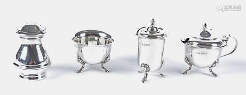 A George VI hallmarked three piece silver Birmingham cruet set, together with another pepper pot,