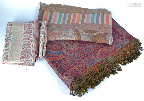 Two contemporary woollen shawls, comprising one with a zari border and decorated with scrolling