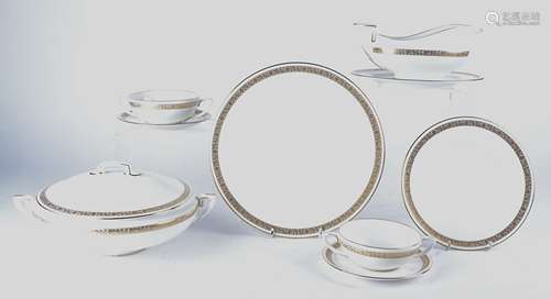 A Royal Worcester part dinner service in the 'Golden Anniversary pattern', comprising nine dinner