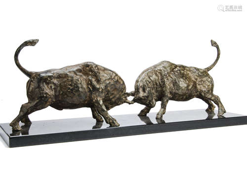 A contemporary bronze figure group, modelled as a pair of fighting horned bulls with tails raised on