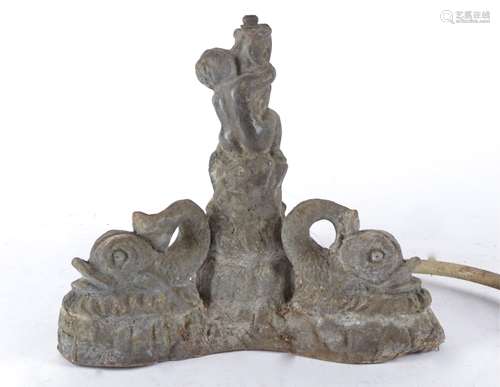 A cast metal garden water feature in the form of a cherub with three mythical dolphins, 26cm x 30cm,