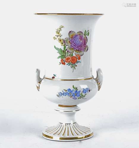 A late 19th Century Meissen twin handled campagna shaped urn with floral studies on a white