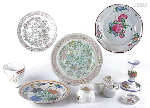 A group of predominantly European ceramics to include tin glazed earthenware plates with hand